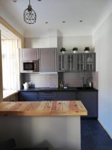 Historic apartment with Wooden floors in the Hearth of Old-town Riga