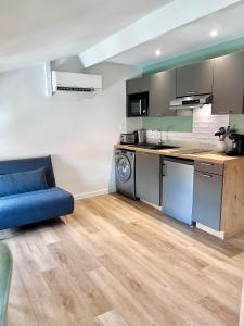 Appart'hotels LE QUAI 5 - Studio NEUF CALME - CLIM - WiFi - Gare a 200m : photos des chambres