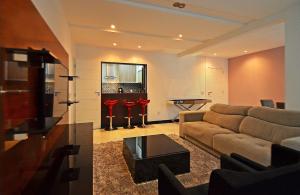 Confortável 3Qts: Vista Lateral Mar