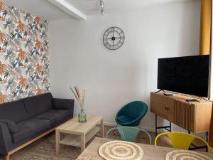 Appartements Les Jardins du Chateau : photos des chambres