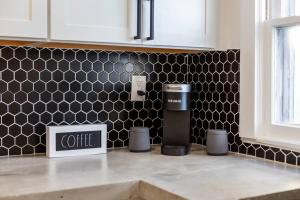 ModernTropic 2bd1ba Near Beach w fence yarddeck