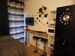 Appartements Charmant Studio : photos des chambres