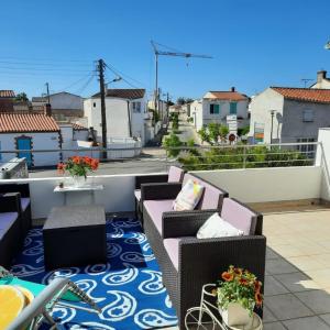 Maisons de vacances 80m avec TERRASSE pres du CENTRE et de la PLAGE : Maison de Vacances