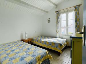 Maisons de vacances Maison Noirmoutier-en-l'Ile, 5 pieces, 8 personnes - FR-1-224B-157 : photos des chambres