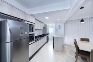 Terrazzo 401A - Apto 2 quartos em condomínio de luxo à 300 metros da Praia de Bombas