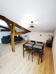 Appartements Appartement neuf climatise sous les toits : photos des chambres