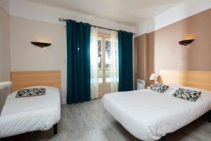 Hotels Hotel Les Rocailles : photos des chambres