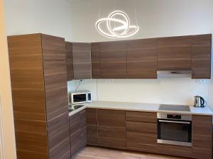 Designed apartment next to Vaclav square with terrace and private garage