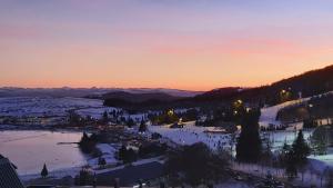 Appartements Un petit coin de paradis a Super Besse : photos des chambres