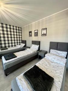 -Noclegi Marki-Pokoje z łazienkami-Parking-EV-okolica Warszawy-