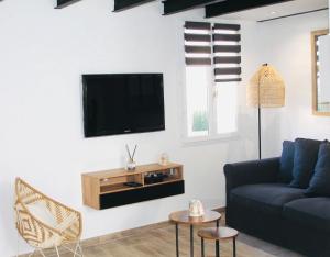Duplex atypique rénové en plein centre du village