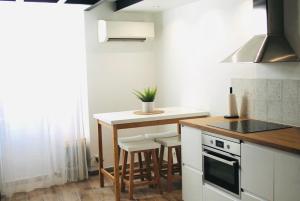 Duplex atypique rénové en plein centre du village