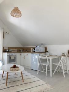 Appartements Studio cosy avec coin jardin : photos des chambres