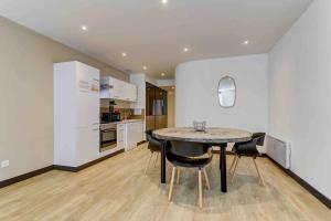 Appartements LA MANUFACTURE - TOPDESTINATION-BOURG - Centre ville - Classe 3 etoiles : photos des chambres