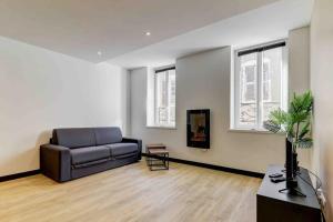 Appartements LA MANUFACTURE - TOPDESTINATION-BOURG - Centre ville - Classe 3 etoiles : photos des chambres