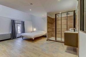 Appartements LA MANUFACTURE - TOPDESTINATION-BOURG - Centre ville - Classe 3 etoiles : photos des chambres