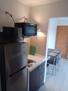 Departamento equipado a pasos del centro.