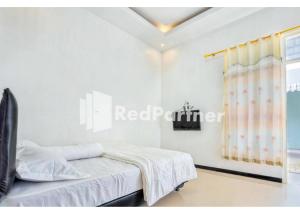 Griya Rahayu Guesthouse Mitra RedDoorz near Jatim Park 2 Batu