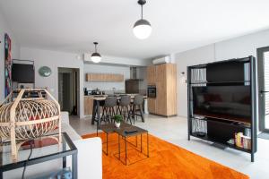 Appartements Bella, Jacuzzi Partage & Parking avec Borne de Recharge Voiture Electrique : photos des chambres