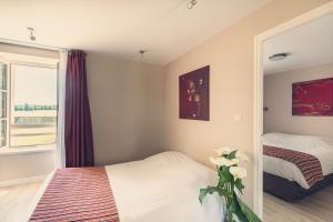 Appart'hotels La Pommeraie : photos des chambres