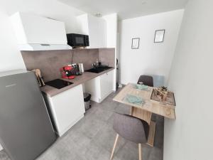 Appartements Logement chaleureux 2 personnes : photos des chambres