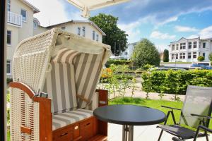 Terrasse, gratis Nutzung vom AHOI Erlebnisbad und Sauna in Sellin - Meeresblick FeWo 78