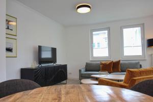 Terrasse, gratis Nutzung vom AHOI Erlebnisbad und Sauna in Sellin - Meeresblick FeWo 78