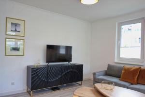 Terrasse, gratis Nutzung vom AHOI Erlebnisbad und Sauna in Sellin - Meeresblick FeWo 78