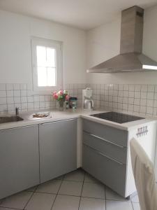 Ferienwohnung am Bodensee mit Wintergarten, Garten und Grillhaus bis 6 Person