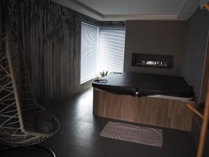 Maisons de vacances Gite Le Renouveau avec jacuzzi privatif : photos des chambres