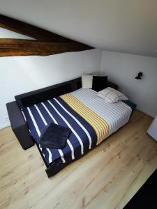 Appartements Appartement neuf climatise sous les toits : photos des chambres