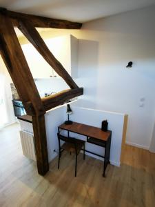 Appartements Appartement neuf climatise sous les toits : photos des chambres