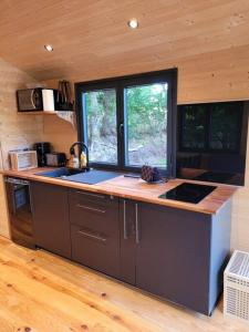 Chalets Roulotte Escapade nature a Morainville - Normandie : photos des chambres