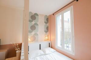 Appartements Appart' Hotel Pink Cosy 5min RER Proche Paris : photos des chambres