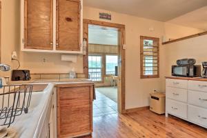 Lakefront Ozark Cottage Deck with Covered Dock!