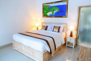 Phòng Deluxe Giường Đôi Có Ban Công (Deluxe Double Room with Balcony)