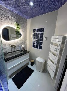 Appartements Pink Tropical Champagne : photos des chambres