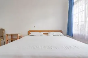 Pall Inn Puncak Mitra RedDoorz - 希萨鲁阿