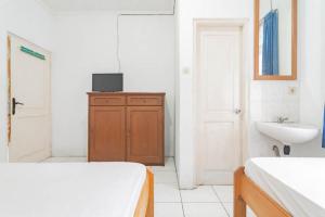 Pall Inn Puncak Mitra RedDoorz