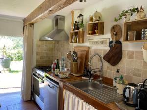 Maisons de vacances LES 2 CHAUMIERES Piscine & Spa : photos des chambres