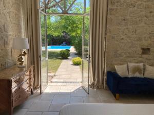 Maisons de vacances Mas de charme Jas de Berrias piscine proche Les Vans Ruoms Gorges Ardeche : photos des chambres