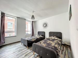 Maison de ville jacuzzi wiffi à 4km aéroport Charleroi