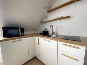 Appartements Les petits galets - T2 - WIFI - Coeur de ville - Parking : photos des chambres