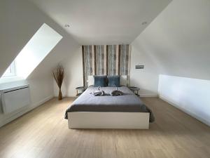 Appartements Les petits galets - T2 - WIFI - Coeur de ville - Parking : photos des chambres