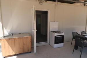 Robinson olive tree huts