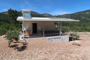 Robinson olive tree huts