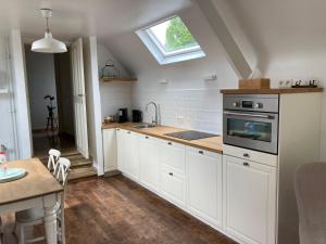 Rustig appartement in het groen met terras