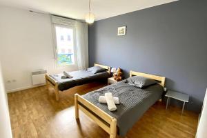 Maisons de vacances Maison pour 6 personnes avec garage et jardin : photos des chambres
