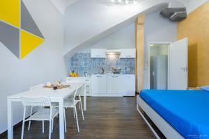 Monolocale Familiare (4 Adulti)