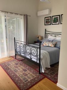 Enjoy own space with a Queen bed, & great views from the deck